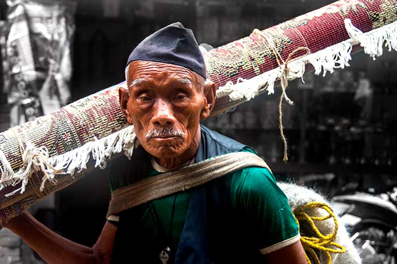 nepal_potraits_indian-rug-salesman_loxley-browne-photography