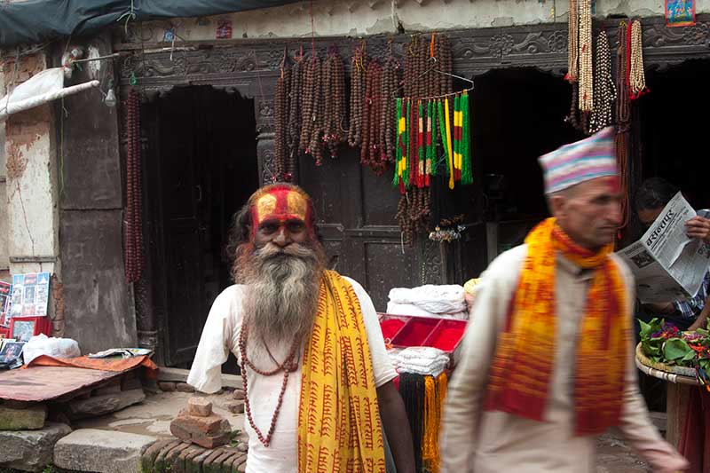 nepal_potraits_one-armed-priest-blur_loxley-browne-photography